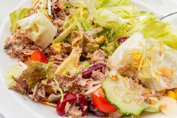 angle view Tuna crunch almond salad at horizontal composition
