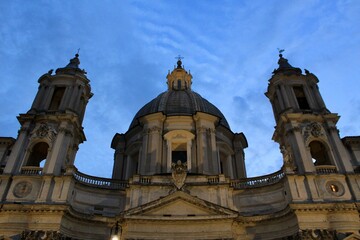 Obraz premium Rome, Italy - September 4 2018: Majestic Facade of Sant Agnese in Agone at Dusk, Piazza Navona, Rome