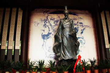 Ancient Quyuan Chinese poet statue or antique aristocrat Qu Yuan monument and building architecture...
