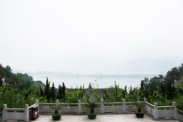 View landscape of Phoenix Mountain and yangtze river with Three Gorges Dam and cityscape Zigui city for chinese people travelers travel visit at poet aristocrat Qu Yuan of Chu museum in Hubei, China