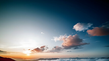 A beautiful cloudy sunrise over mountains and a vast open sky