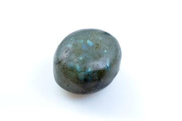 Polished Natural Labradorite Stone Displaying Iridescent Blue Shine on White Background