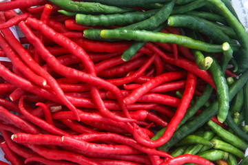 Fresh red chilies arranged on the table, red chilies are a commodity that is much in demand as a cooking spice