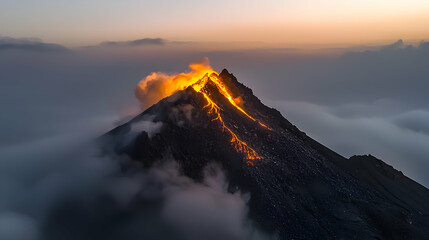 A dark mountain with flowing lava glowing brightly in the sky