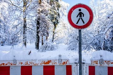 warning sign in german - path closed due to snowfall