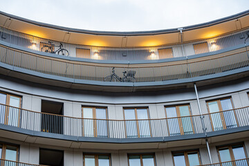 Fototapeta premium Stockholm, Sweden A bicycle parked on a balcony in the Plankan urban development building in the Sodermalm district.
