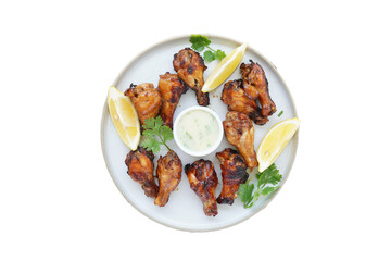 Grilled chicken leg and sauce on white plate, transparent background