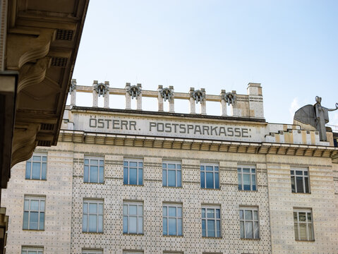 VIENNA, AUSTRIA - 28. July 2024: &Ouml;sterreichische Postsparkasse (Austrian postal savings bank) sign on the building exterior. Facade of the Postsparkassenamt building in the art nouveau style.