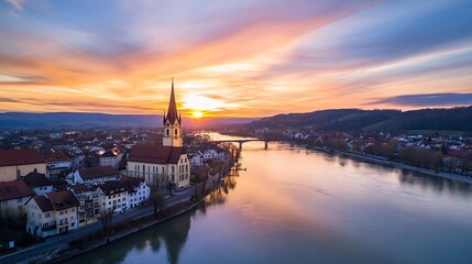 Stunning aerial view of a picturesque town on the river during a vibrant sunset : Generative AI