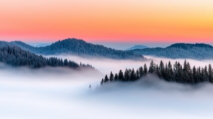 Fototapeta premium Misty Sunrise Over Snow Covered Hills
