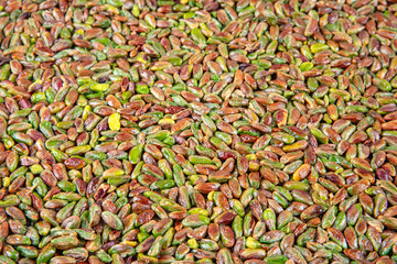 Pistachio kadayif.Kadayif dessert with syrup, whole pistachios on top, sliced ​​grated yufka on...