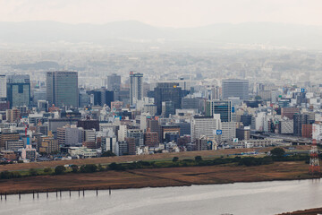 Osaka panorama, aerial cityscape with Yodo Seta River embankment and skyscrapers, Osaka prefecture, Japan, Umeda business district, streets of Osaka downtown center, seen from observation deck