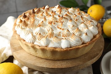 Delicious meringue pie on table indoors, closeup