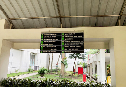 Hospital Information Board: An overhead information board providing details on an hospital building.