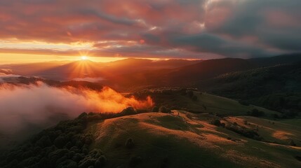 Fototapeta premium Breathtaking Sunrise Over Rolling Hills and Misty Valley Landscape