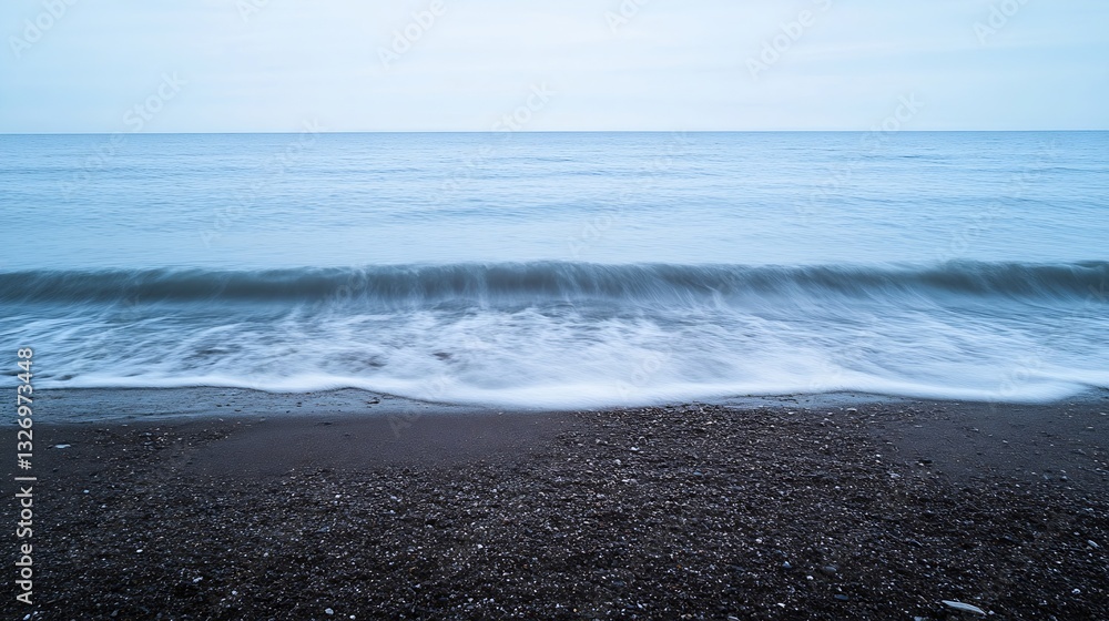 Aufkleber calm and serene seascape of gentle waves lapping on pebbled shore under overcast sky : generative ai