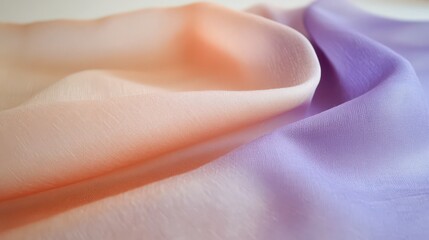 Elegant soft flowing chiffon fabric with captivating peach and lavender hues