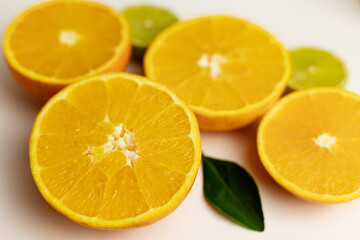 Close-up of cut oranges. Orange juice. Orange diet
