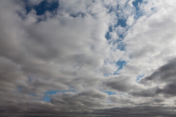Morning sky with pink clouds, sunrise and daylight saving time
