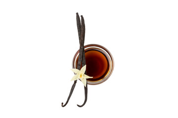 Vanilla extract in glassware isolated on white background. Vanilla extract for baking and desserts. Aromatic Homemade Vanilla Extract. Close -up. Place for the text. Copy space.