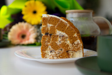 A piece of cake stands on the table.