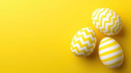 Fototapeta premium Yellow and White Easter Eggs on Yellow Background
