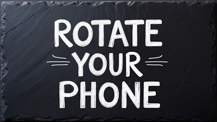 Obraz premium This image features bold white text on a textured dark slate background, with an emphasis on encouraging users to adjust their device orientation