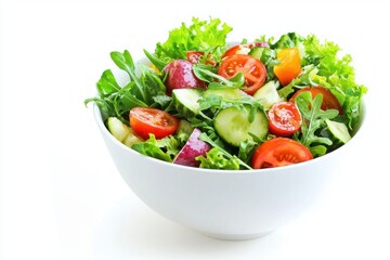 Fresh colorful summer salad with mixed green lettuce tomatoes and cucumber in white ceramic bowl studio shot