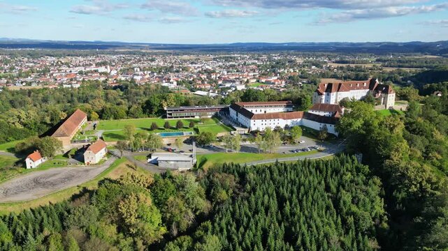 Aerial view of Seggau Abbey surrounded by lush greenery and rural fields, Seggauberg, Leibnitz, Styria, Austria.