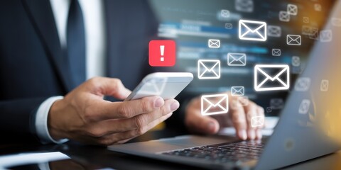 Urgent Email Notification: Businessperson Receiving Alert on Smartphone and Laptop