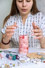 Woman fortune teller telling by candlelight. light fortune teller