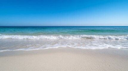 Fototapeta premium Idyllic beach scene with calm waves and clear blue sky creating a serene coastal atmosphere : Generative AI