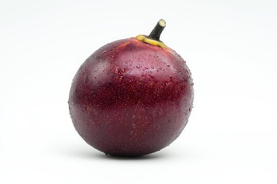 Exotic grenadia fruit glistening with refreshing droplets on a clean white canvas a captivating still life