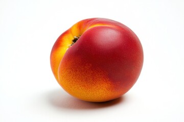 Obraz premium Exquisite nectarine in closeup with vibrant color and smooth skin against neutral background creating a fresh mood