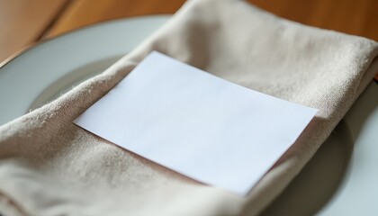 HighQuality Mockup: White Plate, Napkin, and Blank Card on Wooden Table. A white card rests on a linen napkin on a white plate.