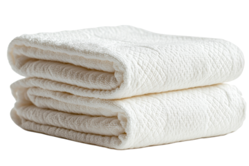 Soft white towels stacked neatly for home or spa use
