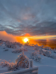 Sunset and typical pale winterlight over Vemdalsskalet's mountains