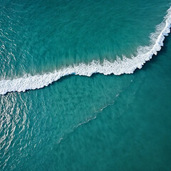 Aerial view beautiful of sea waves from drone. Stock image of blue color of ocean water, sea surface. Top view on turquoise waves, clear water surface texture.