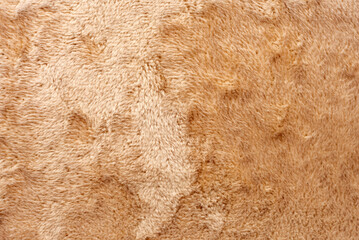 Texture of dense brown fabric for tailoring. Canvas. Textile. Material. Velour