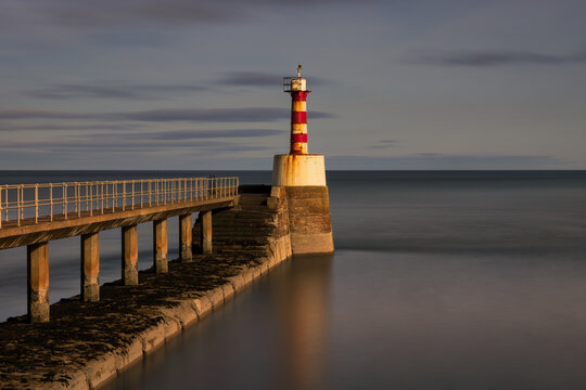 Amble lighthouse and pier on the Northumberland coast