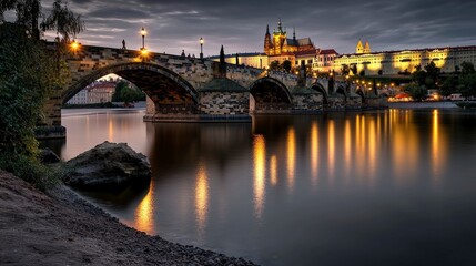 Obraz premium Evening reflections on charles bridge prague night photography serene river wide angle urban beauty