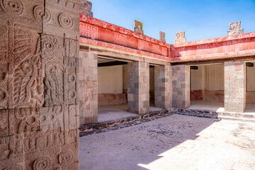 Intricate courtyard of an ancient palace in Teotihuacán, Mexico, showcasing carved stone columns...