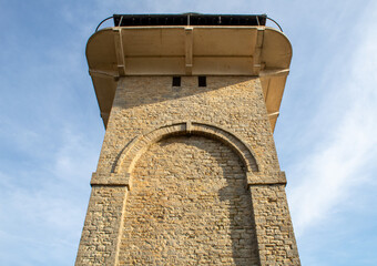 water tower, ancient stone building, England
