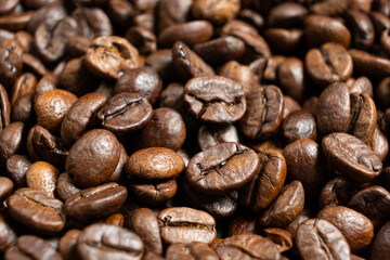 Scattered coffee beans top down macro shot