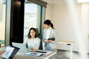 Women collaborating in a modern office space during a productive business meeting
