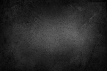 Grey textured concrete wall background. Dark edges