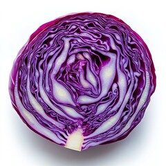 Obraz premium A red cabbage, cut in half, with the inside of one side showing a pattern of purple and white stripes.