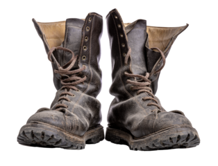 Pair of worn leather boots isolated on transparent background