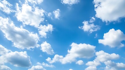 Obraz premium Vast blue sky filled with fluffy white clouds creating a serene and calm atmosphere for nature lovers : Generative AI