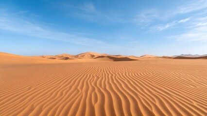 A vast desert landscape featuring rolling sand dunes under a clear blue sky with gentle ripples in the sand. Concept Desert Landscape, Rolling Sand Dunes, Clear Blue Sky, Gentle Sand Ripples
